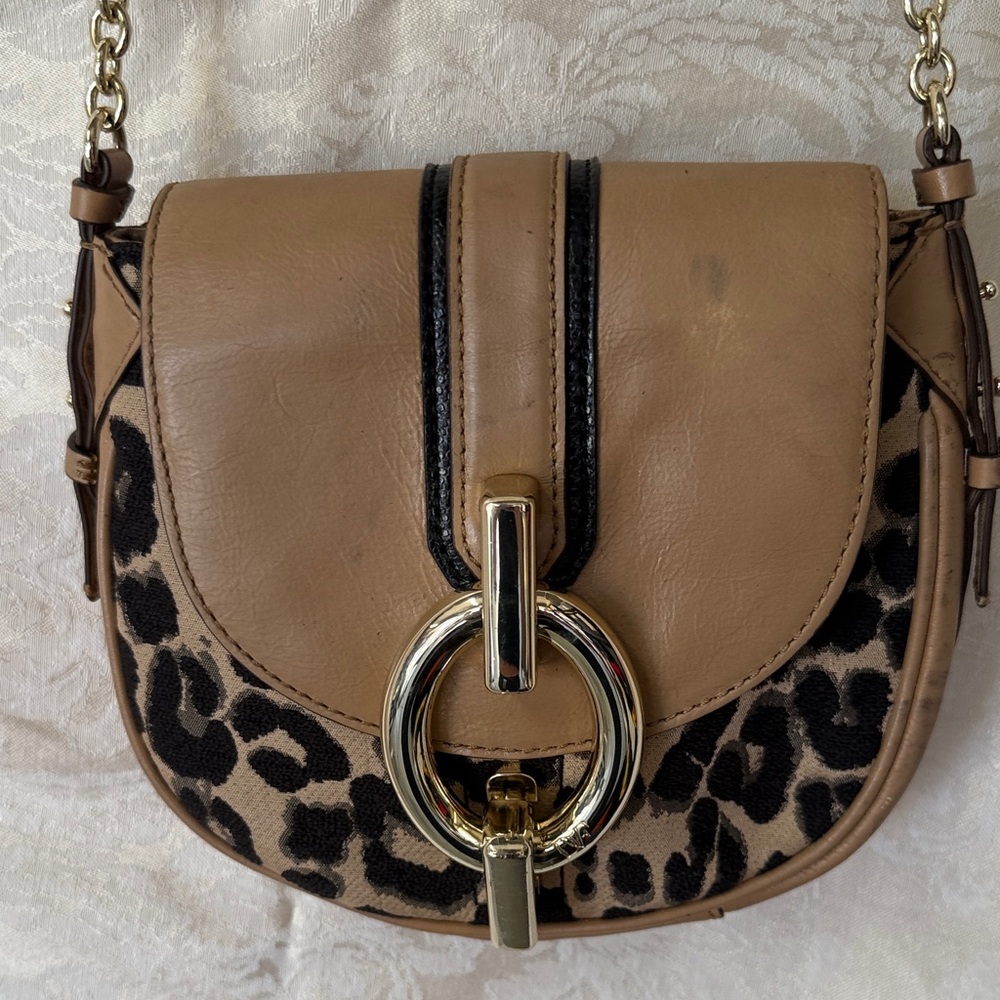 Vintage Diane Von Furstenberg Tan/Black leather w/cheetah.Gold chain strap/clasp